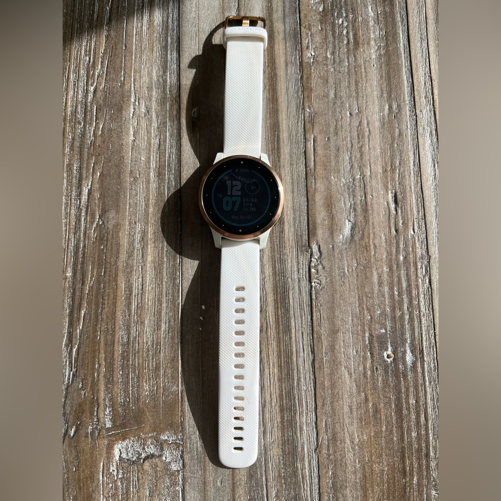 Garmin Smartwatch with White and Gold Accents